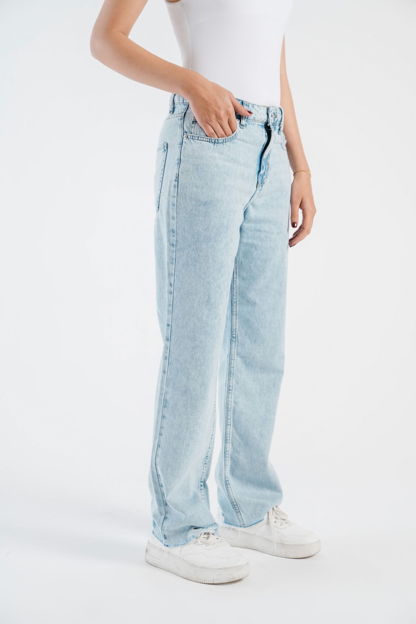 Straight Fit Jeans With Distressed Hem